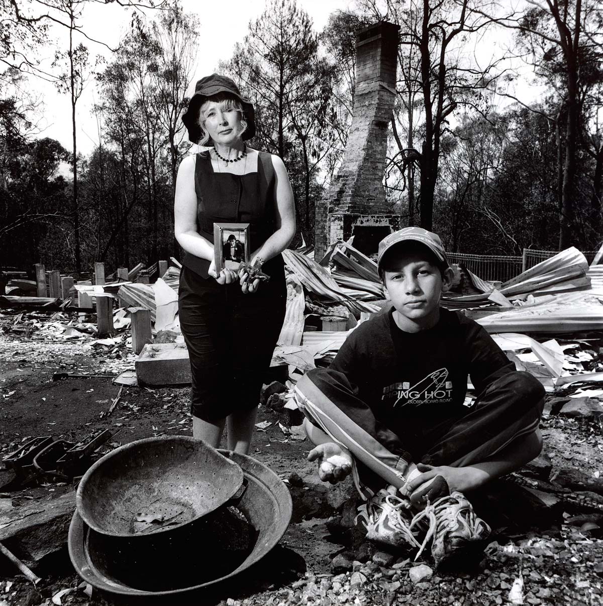 Portrait among home ruins, Black Christmas Bush Fires 2001, Australia
