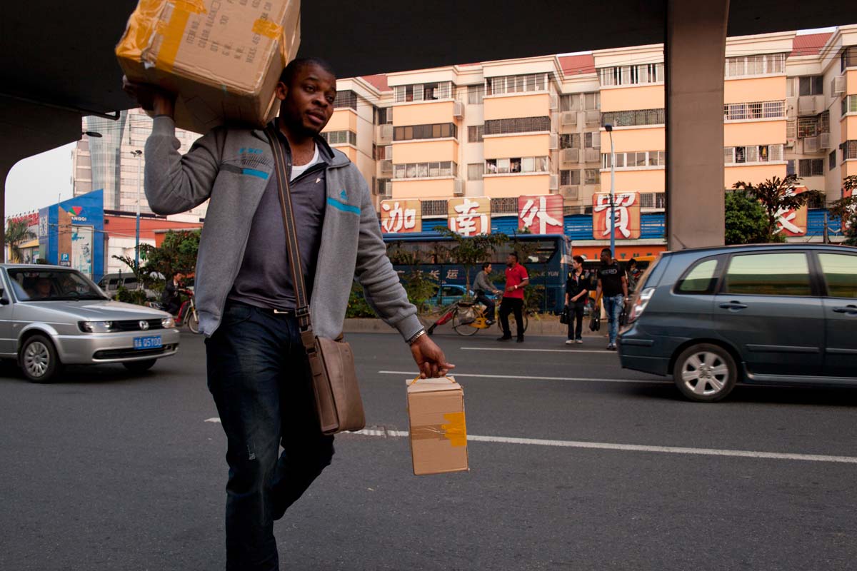 reportage magazine documentary feature photography, African merchants in  Guangzhou, China