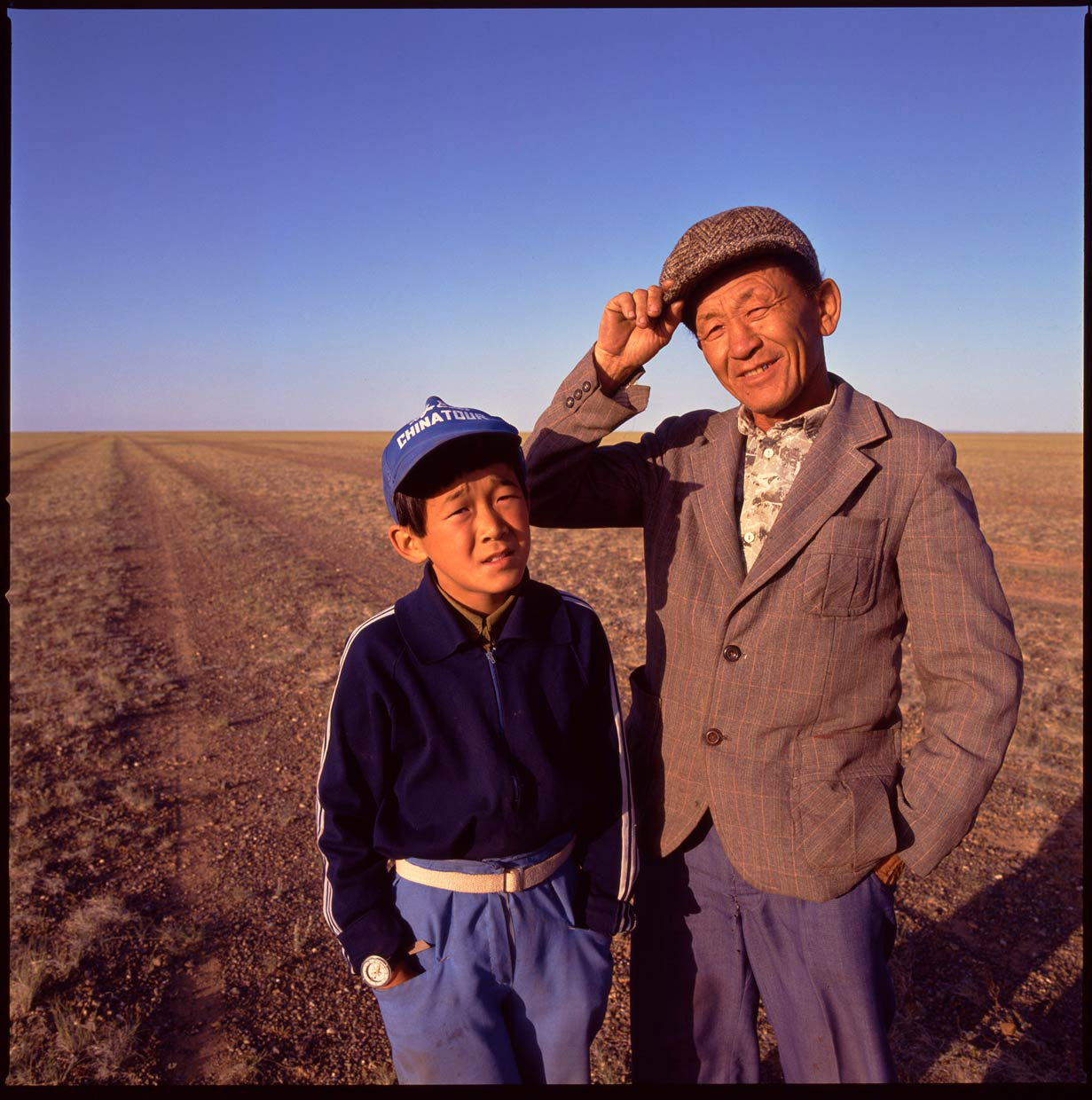 driver-and-son_Gobi-desert_Mongolia